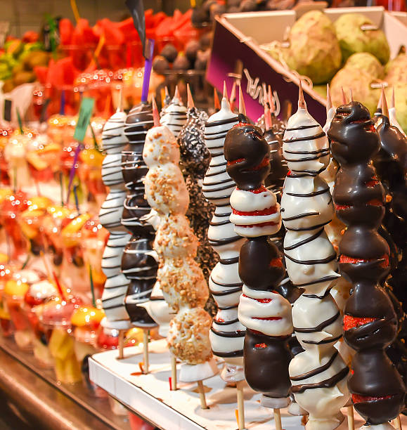 istock Fresh strawberries covered with chocolate on stick 613681098