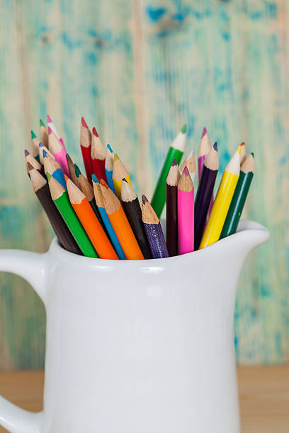 istock color pencil in white jar 613681926