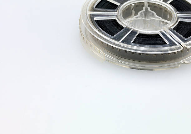istock analog film detail on white background 613682336