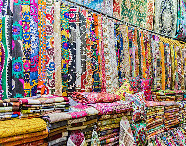 Bolts of Fabric for Sale in Grand Bazaar Bolts of colorful fabric are for sale in the Grand Bazaar in Istanbul, Turkey grand bazaar istanbul stock pictures, royalty-free photos & images
