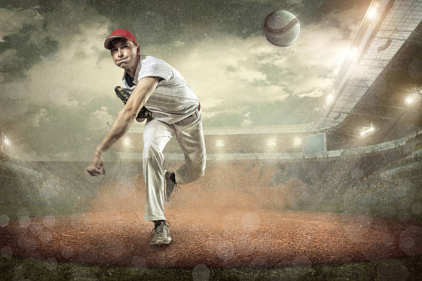 istock Baseball players in action on the stadium. 613683770