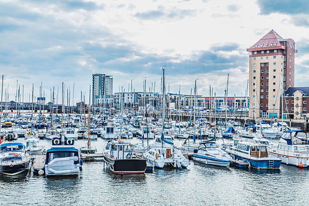 A dramatic view of Swansea Marina packed with boats.