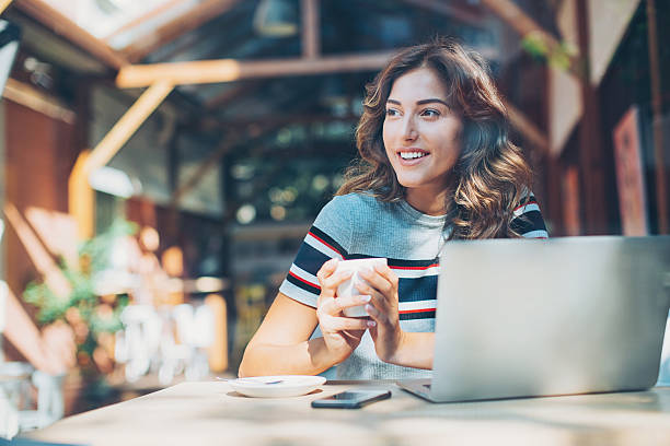 istock Serene woman in cafe 613685686