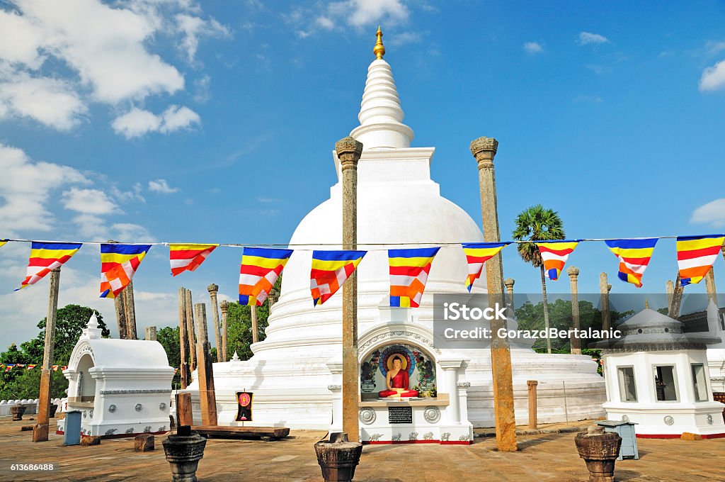 Thuparamaya Dagoba (Stupa) and Buddhist Flags, Anuradhapura, Sri Lanka Thuparamaya is a dagoba in Anuradhapura, Sri Lanka. It is a Buddhist sacred place of veneration. Anuradhapura Stock Photo