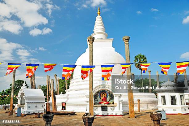 Thuparamaya Dagoba And Buddhist Flags Anuradhapura Sri Lanka Stock Photo - Download Image Now