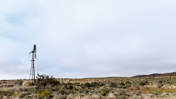 istock Windpomp In The Karoo - Fraserburg Landscape 613691562