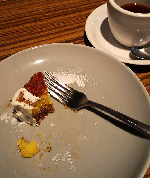 istock Half eaten cake and coffee 613693240
