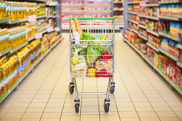 istock Trolley full of products 613693302