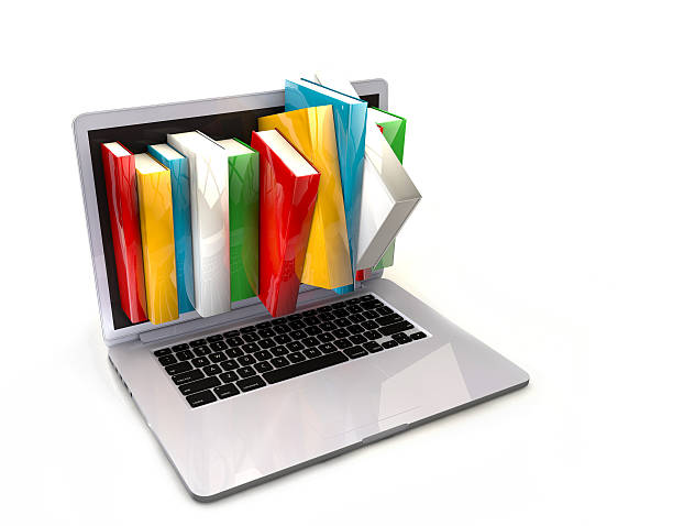 istock E-book library concept with laptop computer and books 613693906