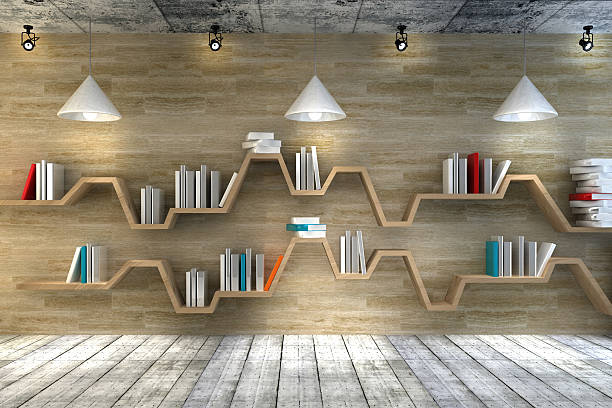 pile of books on a bedside cabinet