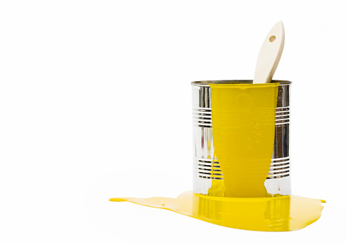 cket with yellow paint isolated on white