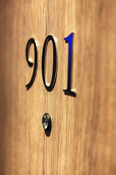 istock Hotel door number, close up image 613696408