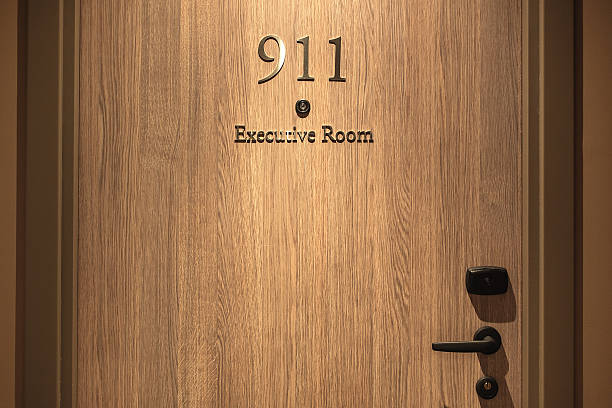 istock Hotel door number, close up image 613696528
