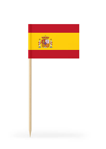 Small Spain flag  on a toothpick. The flag has nicely detailed paper texture. High quality 3d render. Isolated on white background.