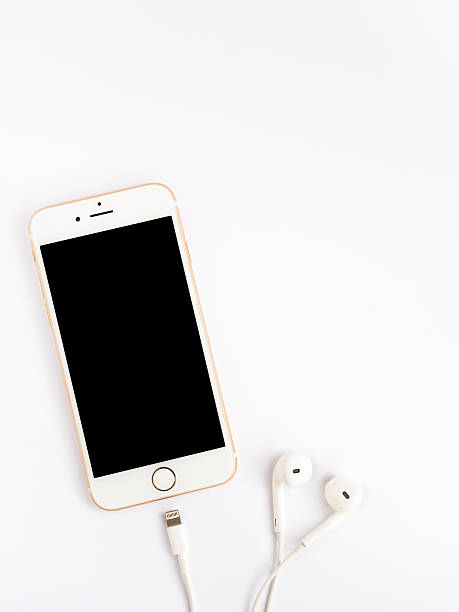 Apple iPhone7 mockup and Apple EarPods mockup Chiangrai, Thailand - September 9, 2016: Front view of new Apple iPhone 7 mockup and new Apple EarPods mockup on white background with copy space. headphones plugged in photos stock pictures, royalty-free photos & images