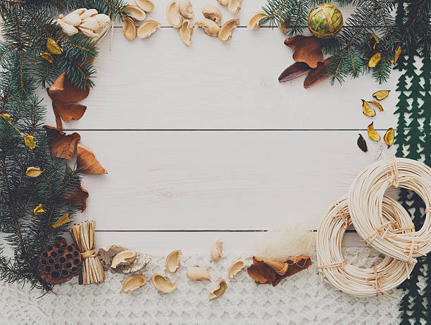 istock Christmas decoration handmade frame on white wood background copy space 613749138