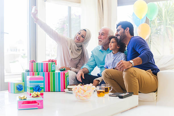 istock Three generation family celebrating a birthday in Dubai. 613749350