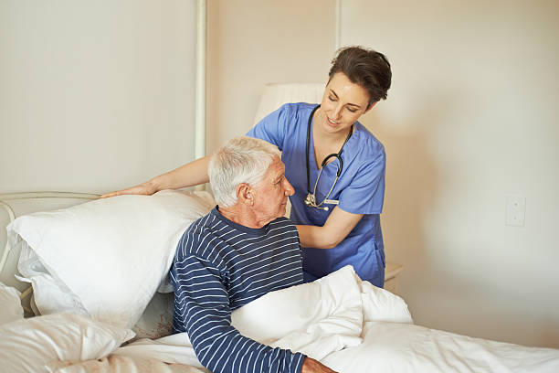istock Attending to her patient's comfort 613750184