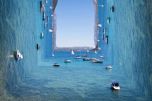 Vista surrealista sobre el soleado mar azul con isla y barcos photo