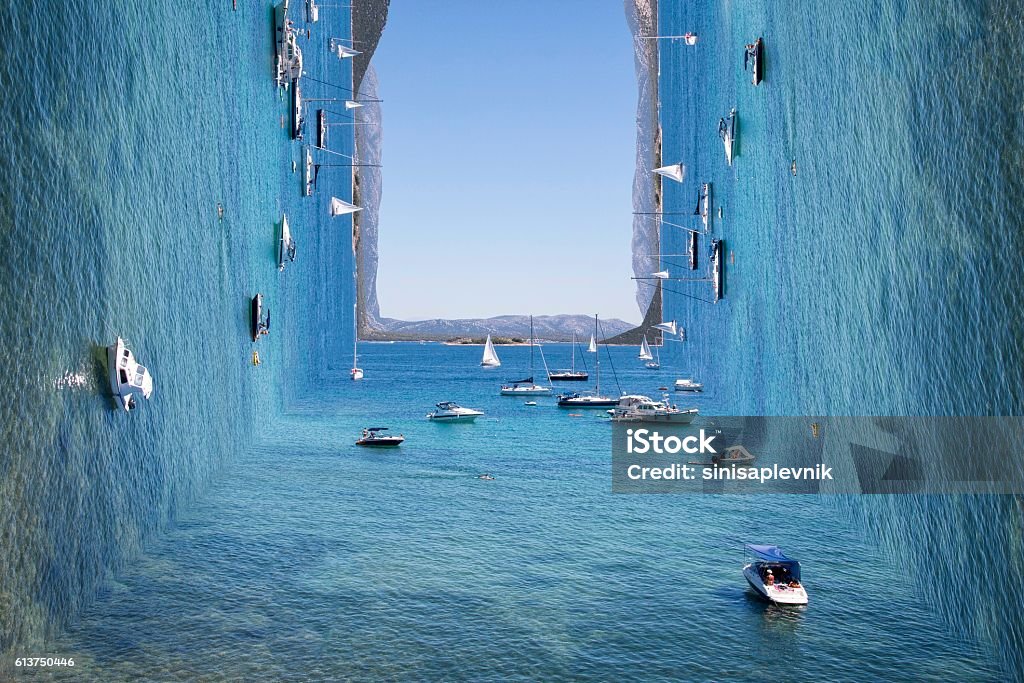 Surreal view on sunny blue sea with island and boats Sailing yachts on the coast of the Croatia. Surrealism Stock Photo