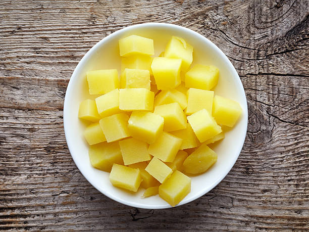 istock bowl of diced boiled potatoes, from above 613750760