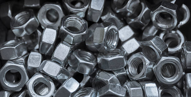istock Heap of screwnuts 613751142