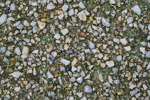 Texture of small stone gravel on the ground