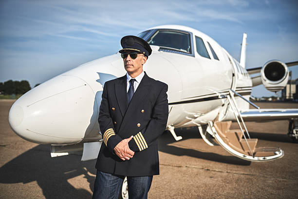 istock Captain of private jet airplane 613751490