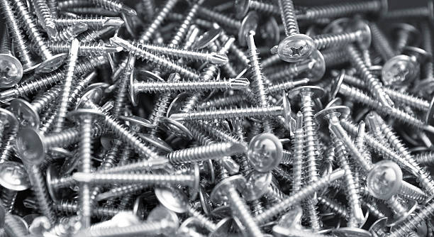 istock Heap of long screws 613751924