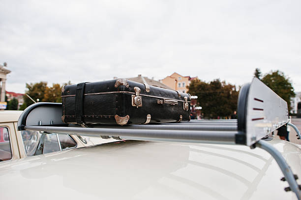 istock Trip with car packed with luggage on the roof 613752222