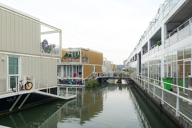 istock Amsterdam experimental neighborhood Steigereiland with floating homes 613752534