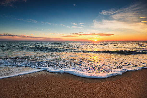 istock Beautiful sunrise over the sea 613752994