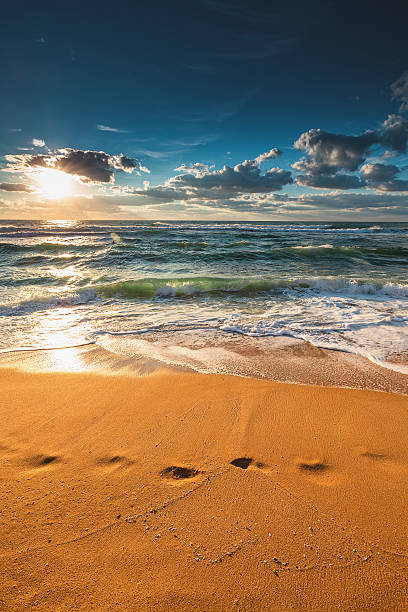 istock Beautiful sunrise over the sea 613753154