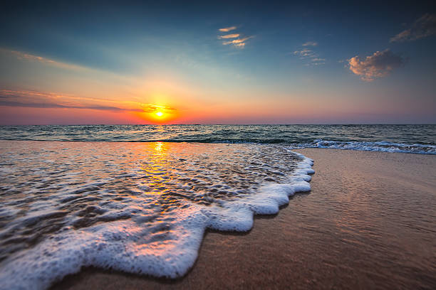 istock Beautiful sunrise over the sea 613753224