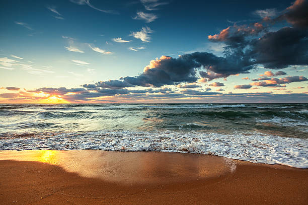 istock Beautiful sunrise over the sea 613753330