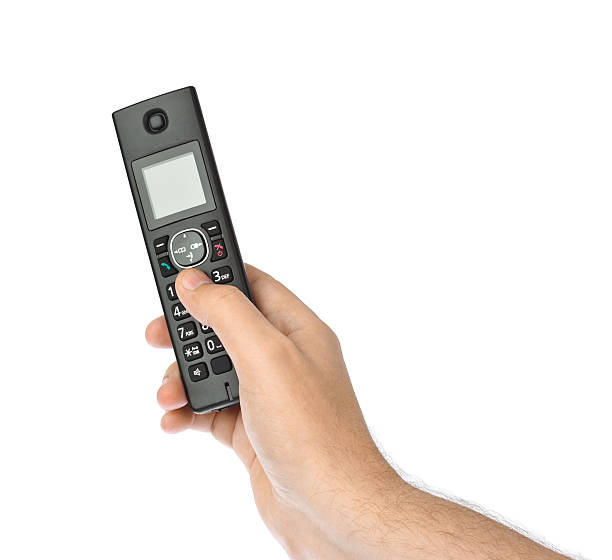 istock Hand with wireless radio telephone 613756064