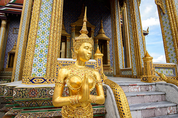 istock Apsara statue at the Emerald Buddha Temple in Grand Palace 613756810