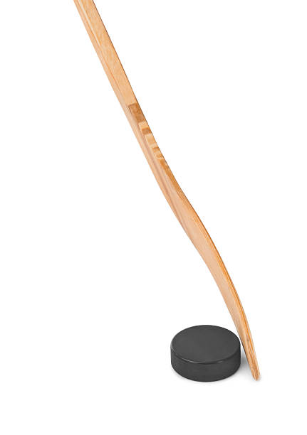 istock Ice hockey stick and puck 613757740