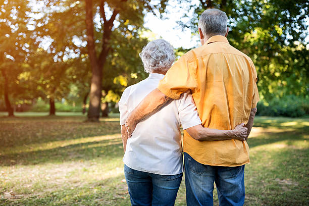 istock Senior couple walking outdoors 613758938