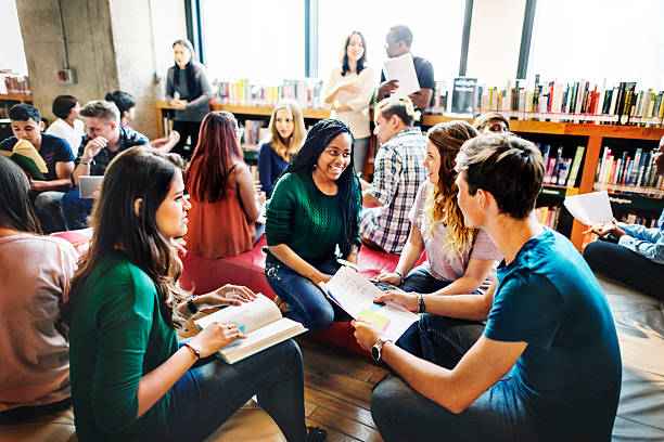 istock Classmate Classroom Sharing International Friend Concept 613759340