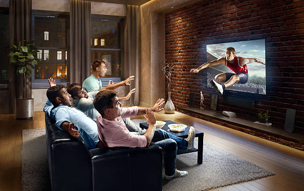 istock Students watching very realistic Hurdling sport on TV 613759870