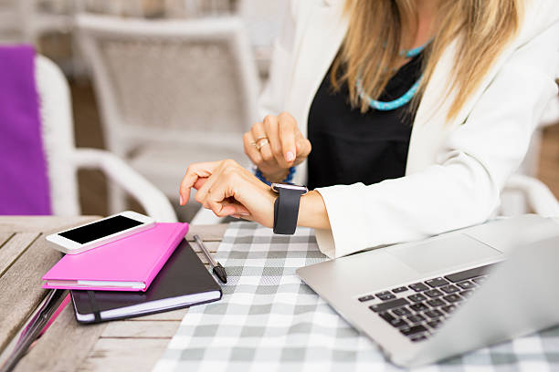 Woman with touch screen watch