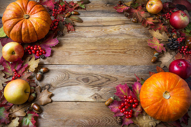 istock Thanksgiving or fall concept with pumpkins and apples, copy spac 613762722