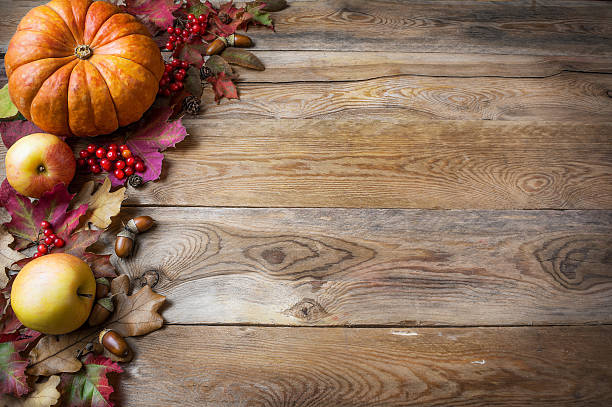 istock Thanksgiving or fall greeting with pumpkins, berries and fall le 613763232