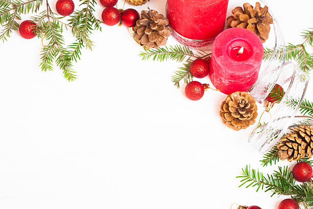 istock Red candles, fir branches and Christmas decorations 613765372