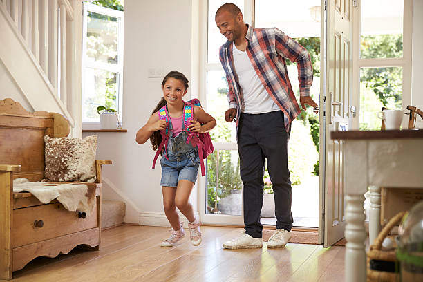 istock Excited Girl Returning Home From School With Mother 613765400