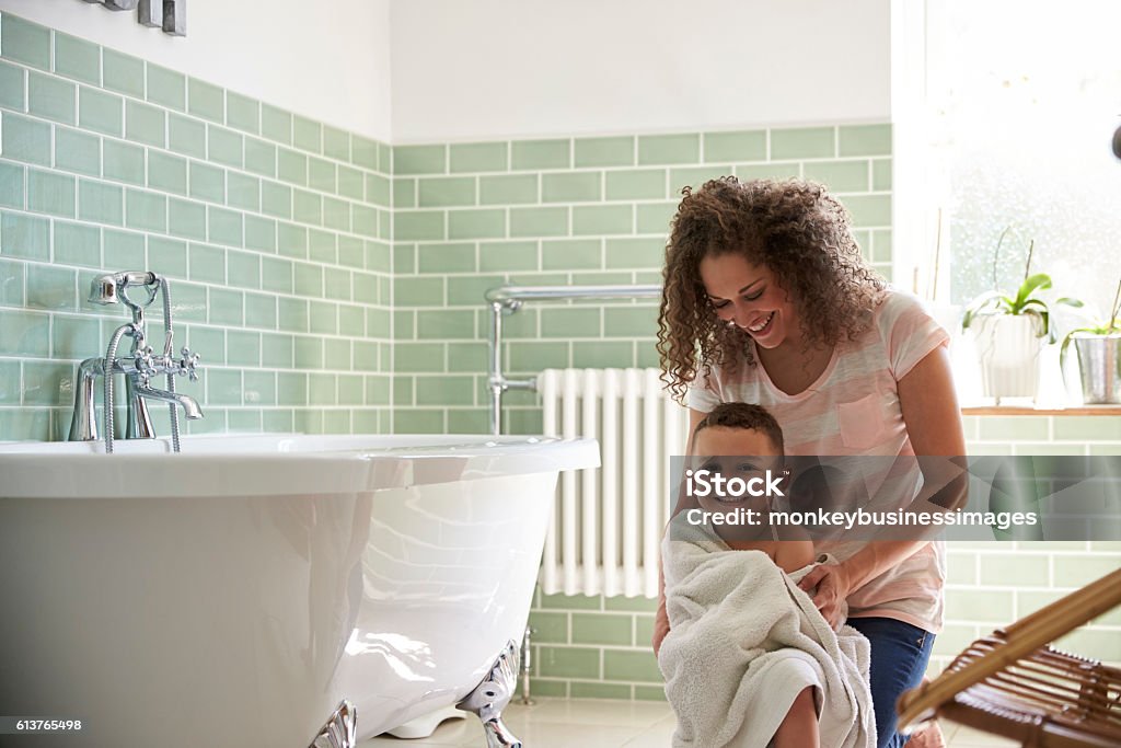 Mother Drying Son With Towel After Bath Child Stock Photo