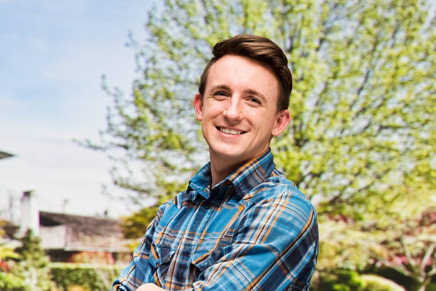 istock Smiling man standing outdoors 613765504