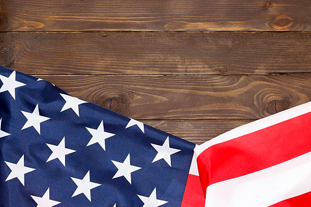 istock American flag wooden background. 613770842