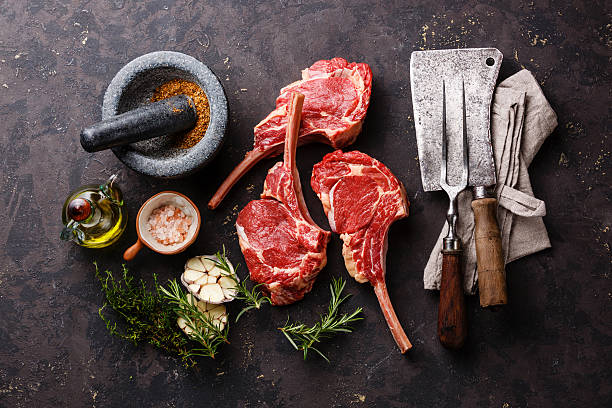 istock Raw meat Veal ribs with ingredients 613771900